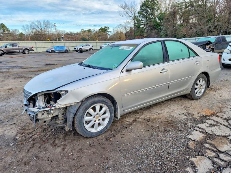 TOYOTA CAMRY LE 2004 with VIN 4T1BE32K74U897757 - Photo from auction