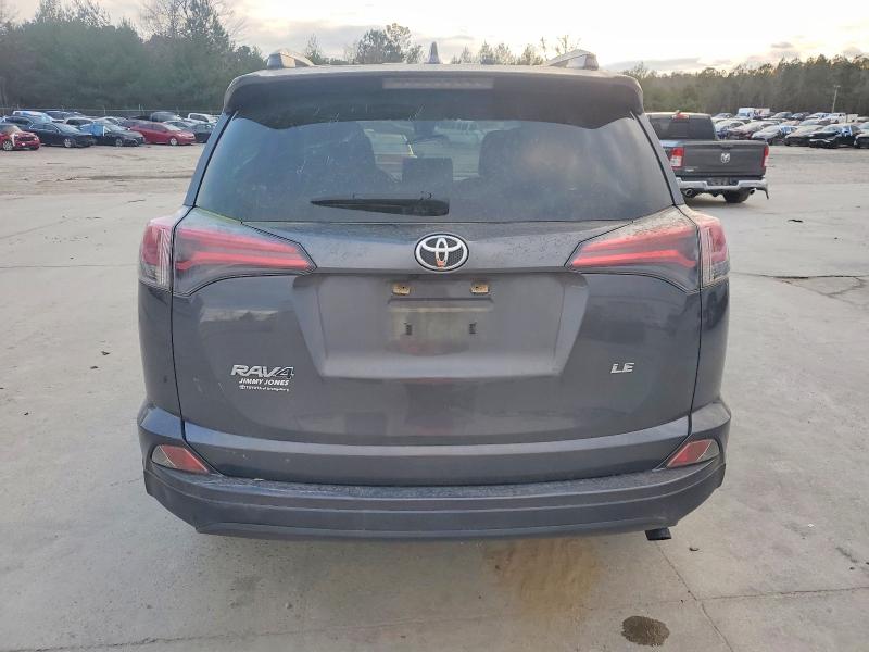 Photo 6 from auction – 2018 TOYOTA RAV4 LE with VIN JTMZFREV6JJ211147