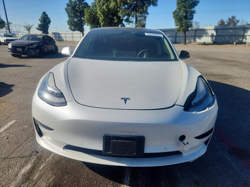 Photo 5 from auction – 2020 TESLA MODEL 3 with VIN 5YJ3E1EA7LF660676