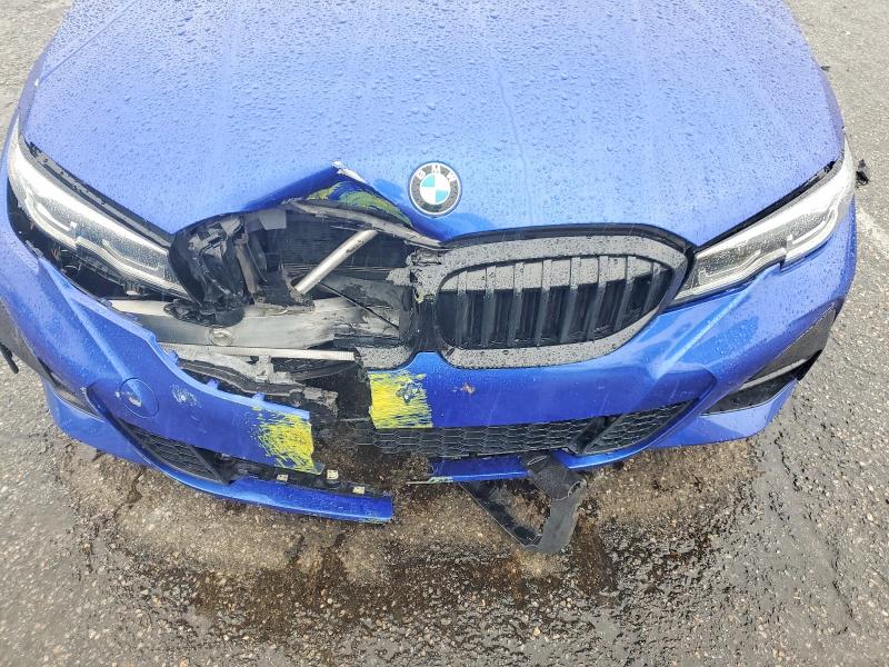 Photo 11 from auction – 2021 BMW 330I with VIN 3MW5R1J00M8C10106
