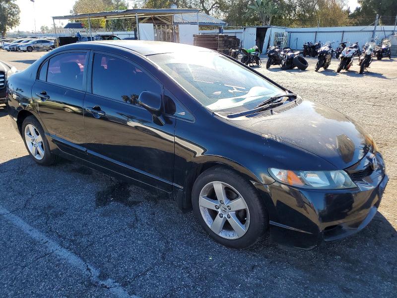 Photo 4 from auction – 2011 HONDA CIVIC LX-S with VIN 19XFA1F69BE004020