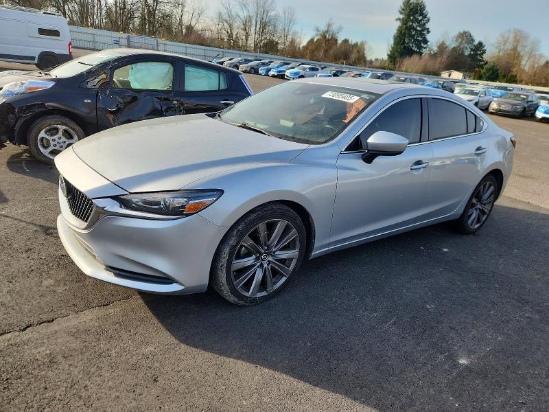 MAZDA 6 2018 with VIN JM1GL1VMXJ1307596 - Photo from auction