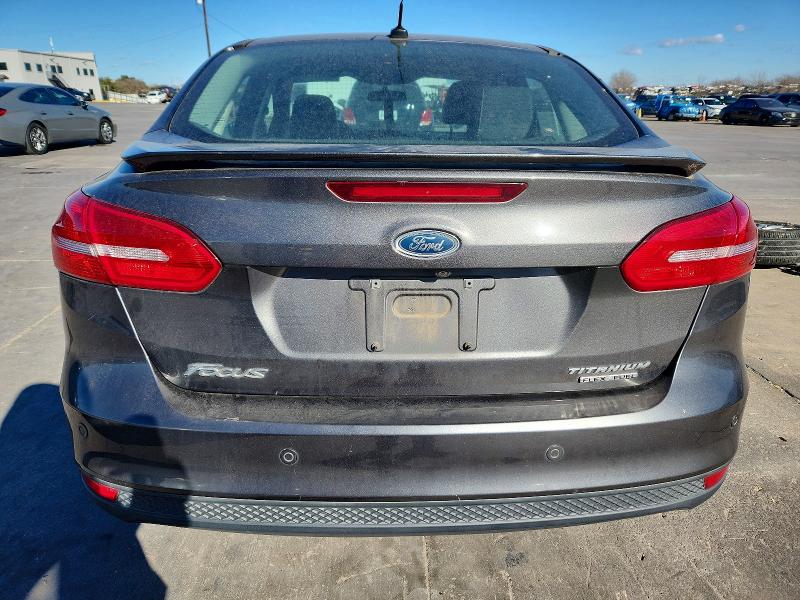 Photo 6 from auction – 2015 FORD FOCUS TITA with VIN 1FADP3J24FL384599