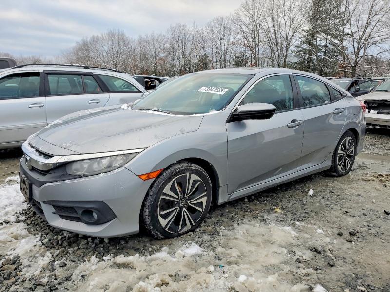 HONDA CIVIC EX 2017 with VIN 19XFC1F36HE208623 - Photo from auction