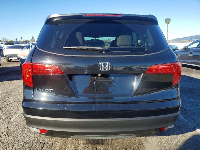 Photo 6 from auction – 2018 HONDA PILOT LX with VIN 5FNYF5H12JB016215