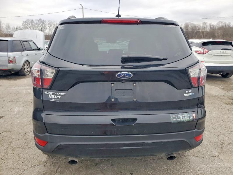 Photo 6 from auction – 2018 FORD ESCAPE with VIN 1FMCU9GD1JUA95107