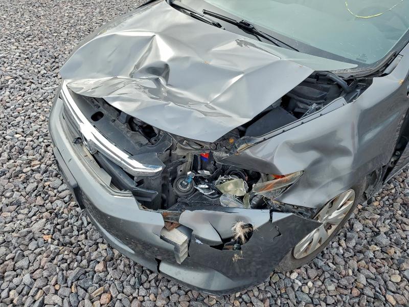 Photo 13 from auction – 2012 HONDA CIVIC LX with VIN 19XFB2F54CE075654