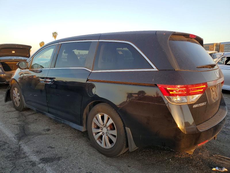 Photo 2 from auction – 2015 HONDA ODYSSEY with VIN 5FNRL5H6XFB091261