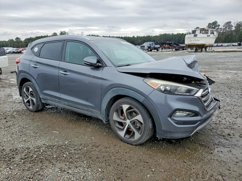 Photo 4 from auction – 2016 HYUNDAI TUCSON with VIN KM8J33A21GU024108