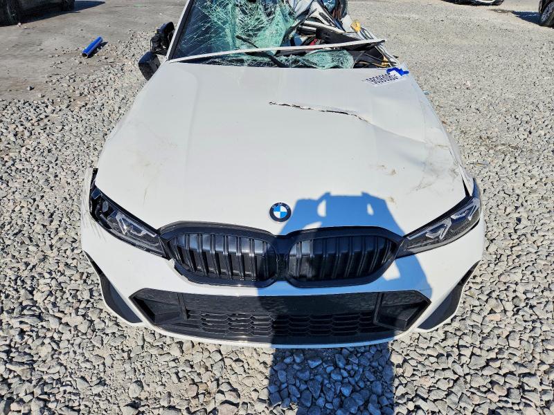 Photo 11 from auction – 2025 BMW 330I with VIN 3MW69CW01S8F46725