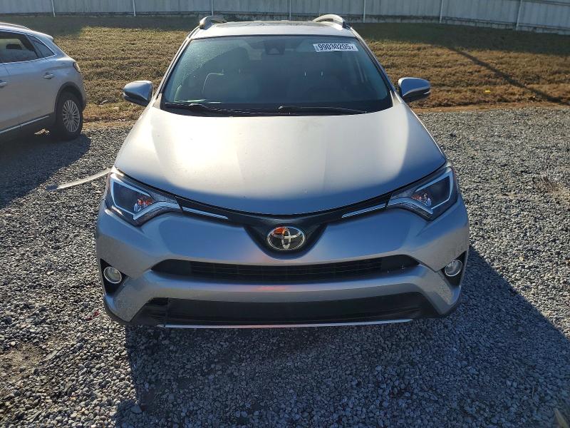 Photo 5 from auction – 2017 TOYOTA RAV4 XLE with VIN 2T3WFREV7HW343817