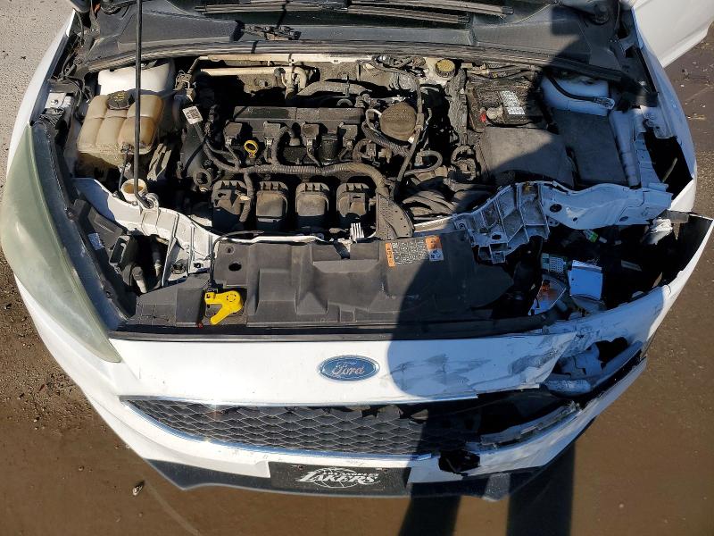 Photo 11 from auction – 2016 FORD FOCUS with VIN 1FADP3F21GL299729