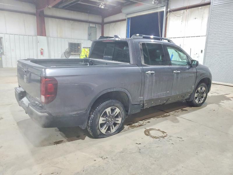 Photo 3 from auction – 2017 HONDA RIDGELINE with VIN 5FPYK3F77HB029258