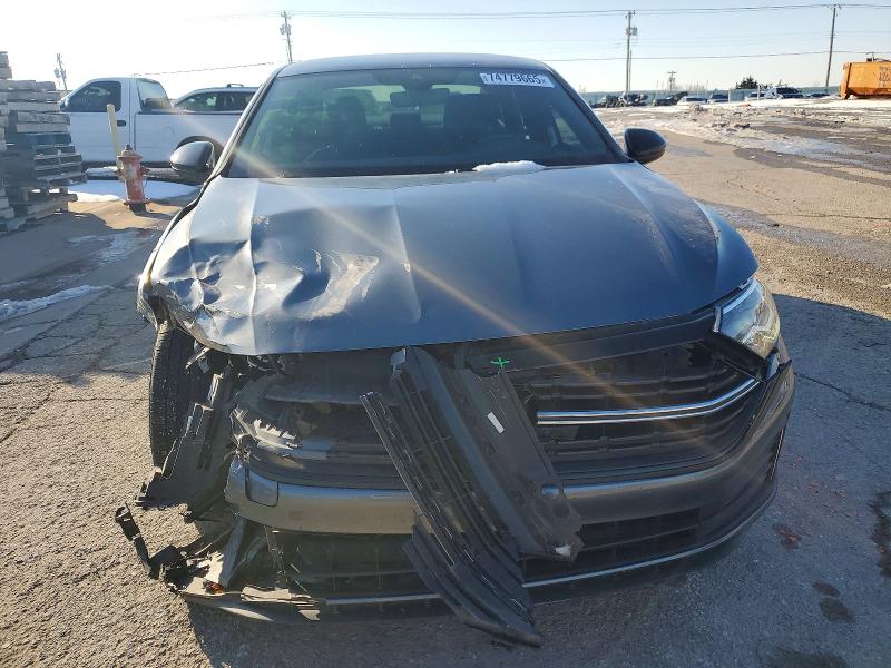 Photo 5 from auction – 2024 VOLKSWAGEN JETTA with VIN 3VWBM7BU4RM100163