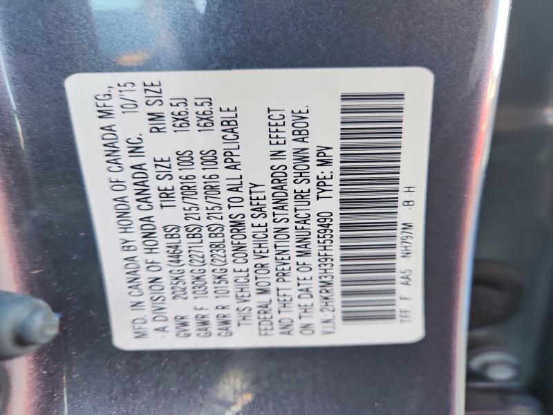 Photo 14 from auction – 2015 HONDA CR-V LX with VIN 2HKRM3H39FH559490