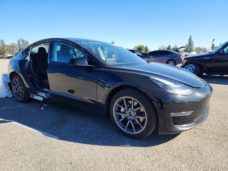Photo 4 from auction – 2022 TESLA MODEL 3 with VIN 5YJ3E1EB9NF195541