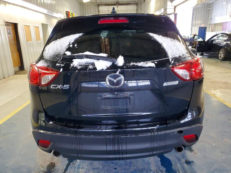 Photo 6 from auction – 2014 MAZDA CX-5 with VIN JM3KE2BE3E0329174