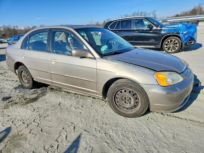 Photo 4 from auction – 2002 HONDA CIVIC LX with VIN 1HGES26752L053859