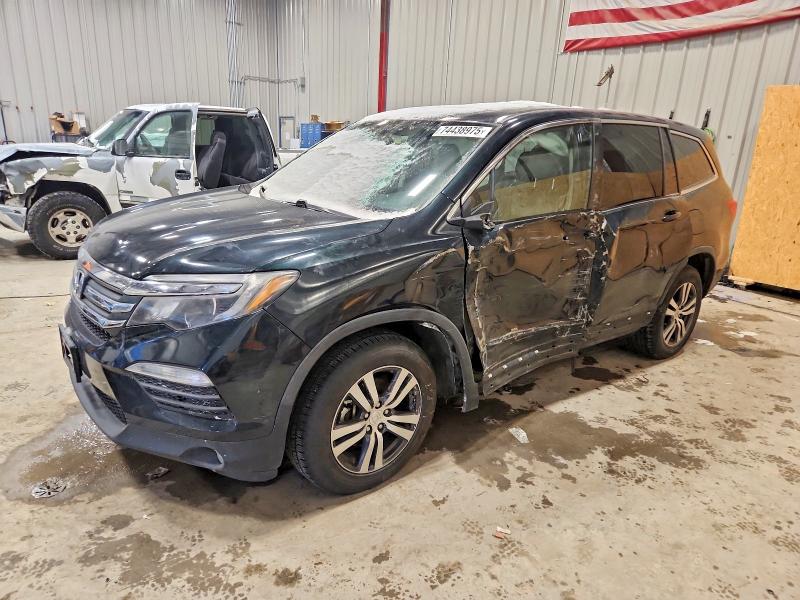 HONDA PILOT EXL 2016 with VIN 5FNYF6H5XGB070380 - Photo from auction