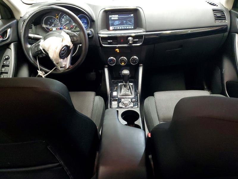 Photo 8 from auction – 2016 MAZDA CX-5 SPORT with VIN JM3KE2BY9G0911910