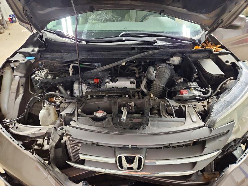 Photo 12 from auction – 2014 HONDA CR-V EXL with VIN 2HKRM4H72EH630326