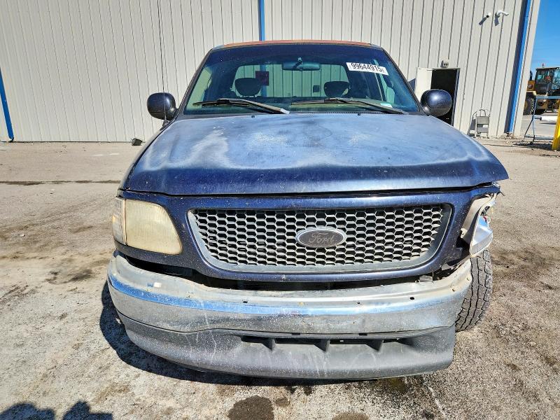 Photo 5 from auction – 2001 FORD F150 with VIN 1FTRX17W81NB43818