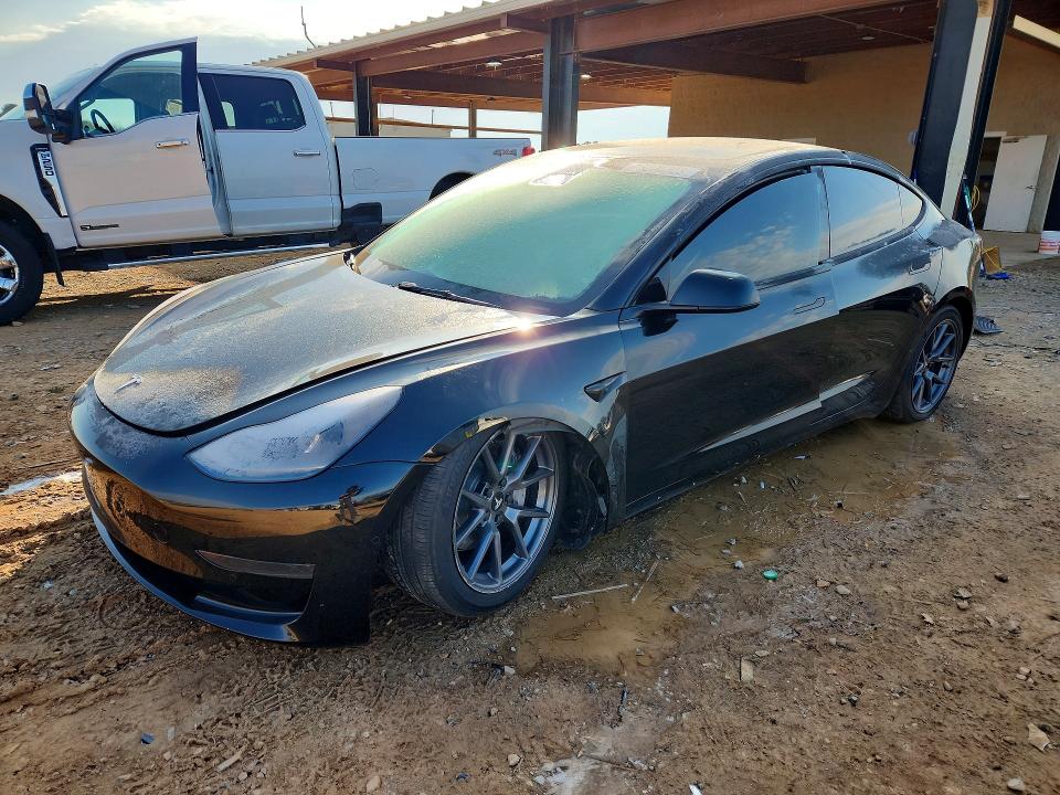 TESLA MODEL 3 2022 with VIN 5YJ3E1EA5NF169526 - Photo from auction