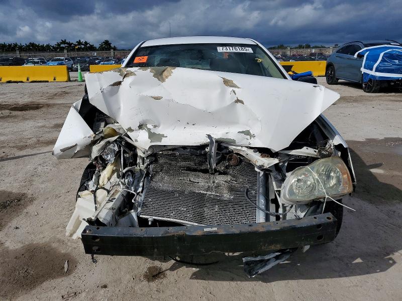 Photo 5 from auction – 2004 TOYOTA COROLLA CE with VIN JTDBR32E942037230