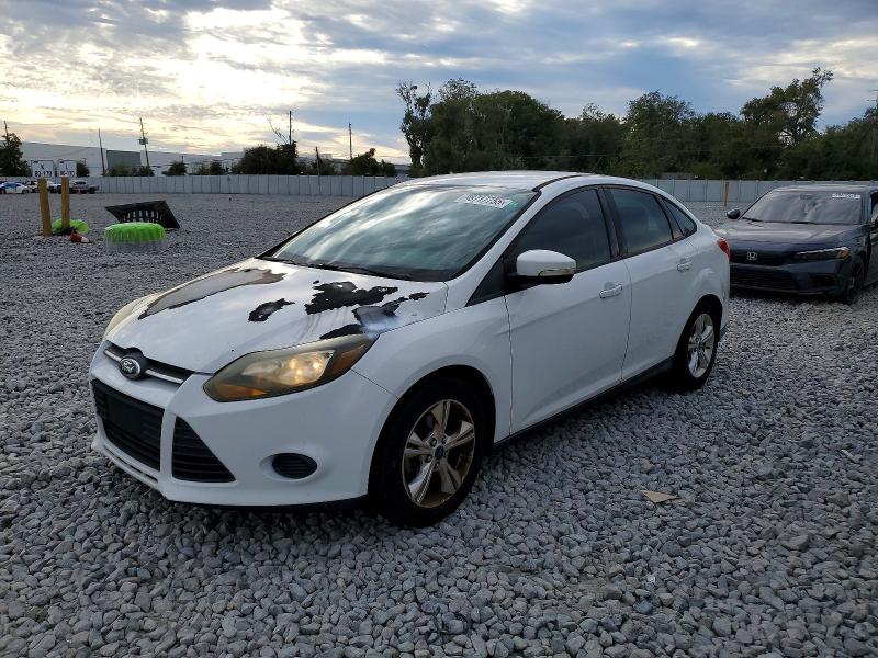 FORD FOCUS SE 2013 with VIN 1FADP3F21DL376384 - Photo from auction