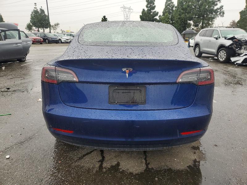 Photo 6 from auction – 2021 TESLA MODEL 3 with VIN 5YJ3E1EAXMF053091