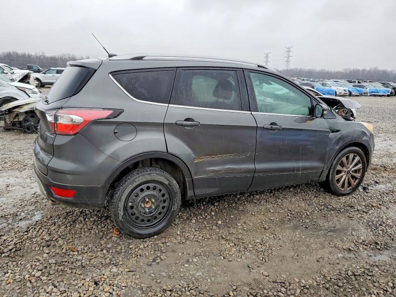Photo 3 from auction – 2017 FORD ESCAPE TIT with VIN 1FMCU0J90HUB30875