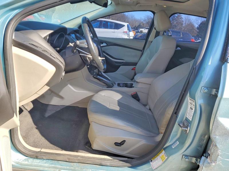 Photo 7 from auction – 2012 FORD FOCUS SEL with VIN 1FAHP3M26CL353024