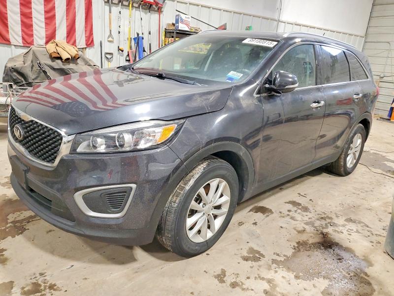 KIA SORENTO 2017 with VIN 5XYPG4A59HG320385 - Photo from auction