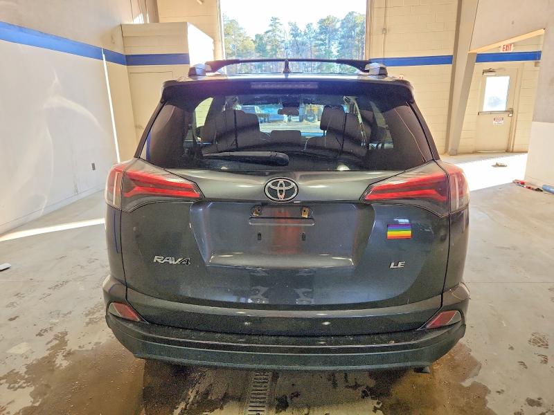 Photo 6 from auction – 2018 TOYOTA RAV4 with VIN JTMZFREV8JJ722407