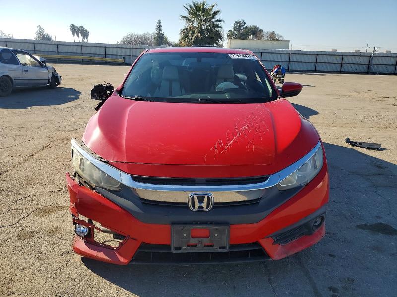 Photo 5 from auction – 2016 HONDA CIVIC EX with VIN 2HGFC3B38GH358500