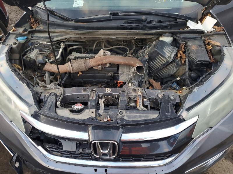 Photo 12 from auction – 2016 HONDA CR-V with VIN 5J6RM4H50GL141219