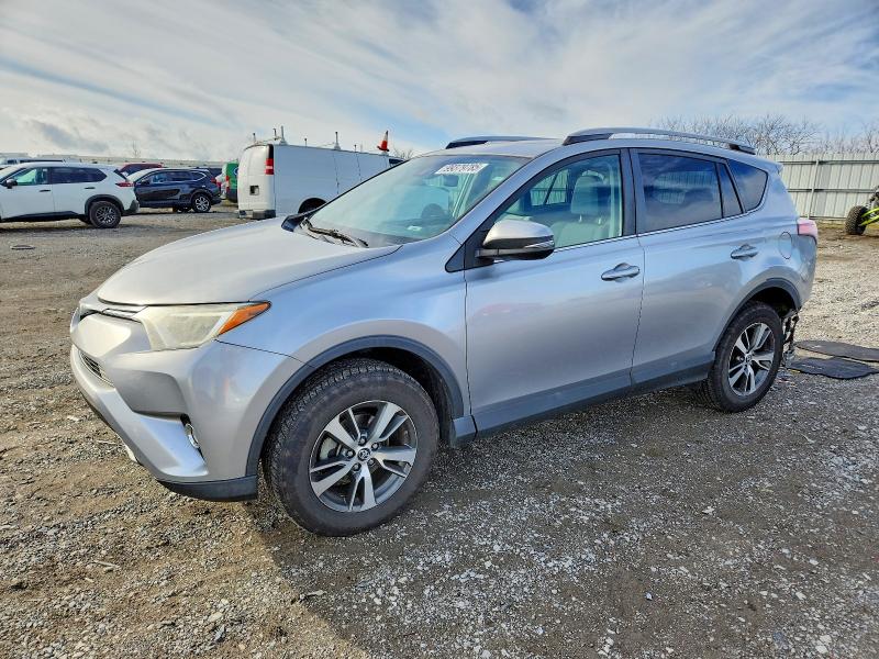TOYOTA RAV4 XLE 2017 with VIN 2T3WFREV6HW393091 - Photo from auction