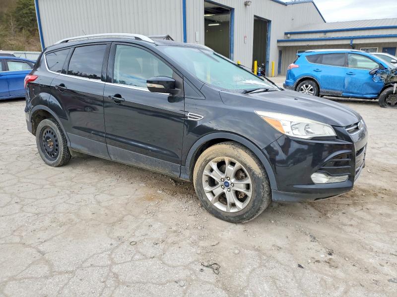 Photo 4 from auction – 2014 FORD ESCAPE TIT with VIN 1FMCU9J91EUE49265