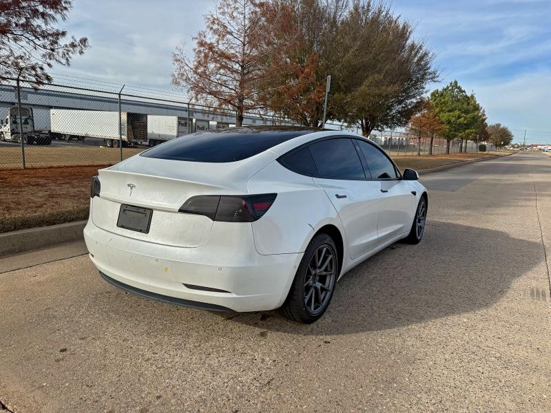 Photo 4 from auction – 2021 TESLA MODEL 3 with VIN 5YJ3E1EA5MF928870