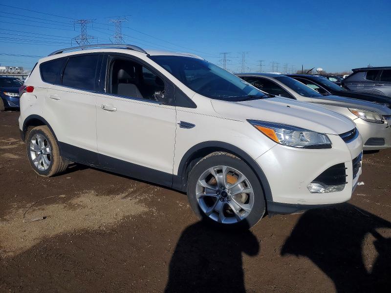 Photo 4 from auction – 2014 FORD ESCAPE TIT with VIN 1FMCU0JX7EUC74904