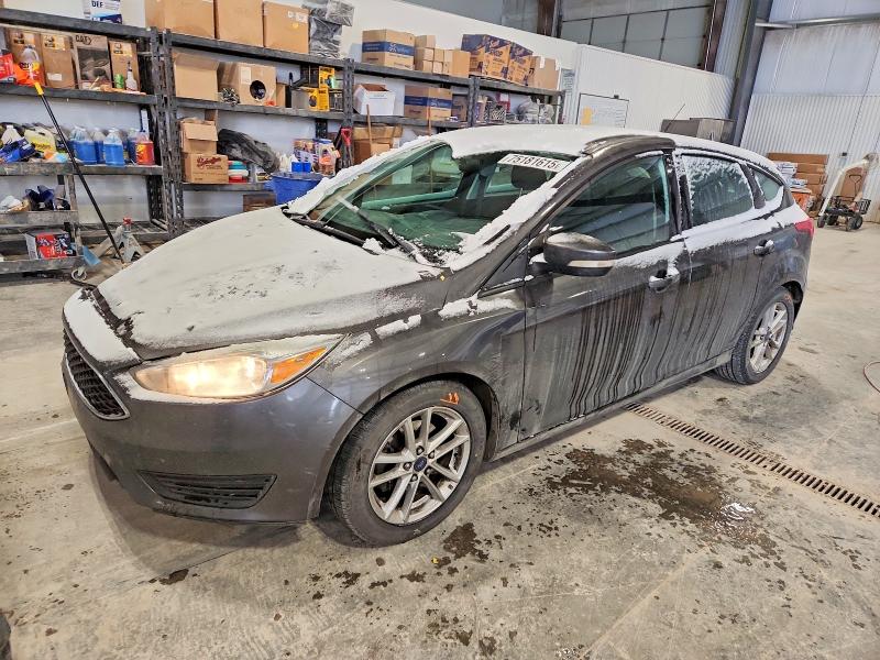 FORD FOCUS SE 2015 with VIN 1FADP3K22FL325582 - Photo from auction