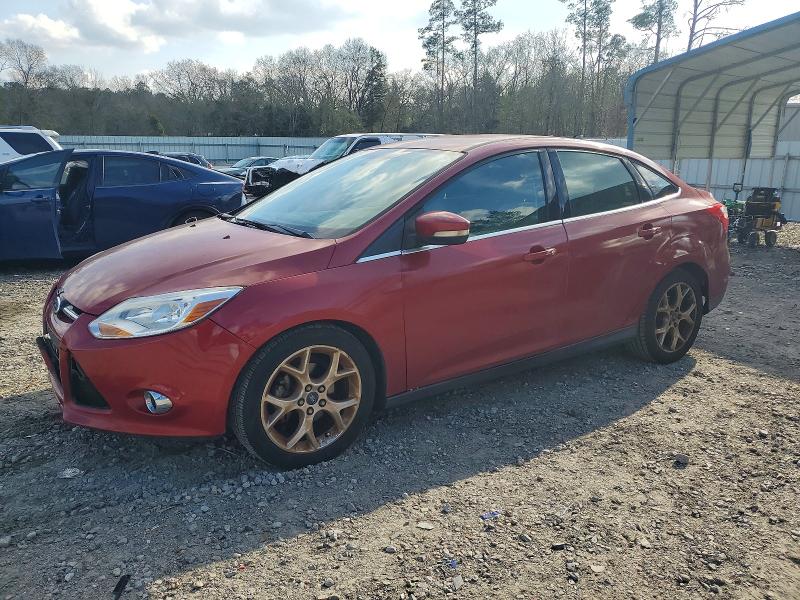 FORD FOCUS 2012 with VIN 1FAHP3H21CL384983 - Photo from auction