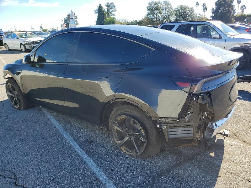 Photo 2 from auction – 2026 TESLA MODEL Y with VIN 7SAYGDED2TF380193