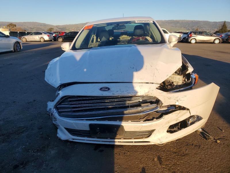 Photo 5 from auction – 2014 FORD FUSION SE with VIN 3FA6P0HD3ER115489