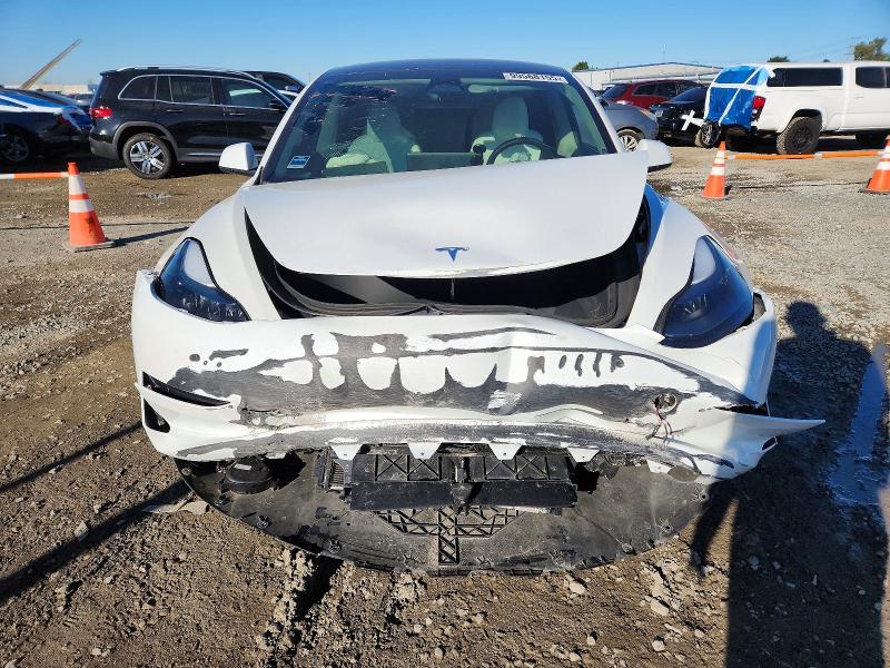 Photo 5 from auction – 2023 TESLA MODEL 3 with VIN 5YJ3E1EA5PF675523