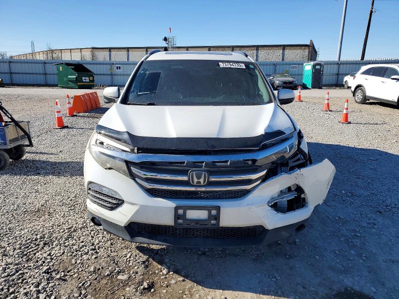 Photo 5 from auction – 2018 HONDA PILOT EXL with VIN 5FNYF6H68JB016351