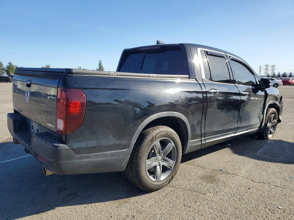Photo 3 from auction – 2021 HONDA RIDGELINE with VIN 5FPYK3F76MB015359