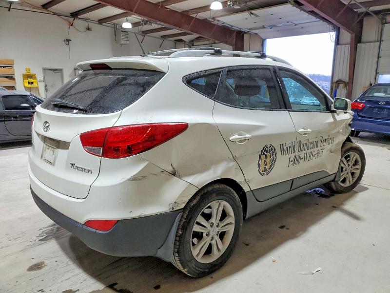 Photo 3 from auction – 2012 HYUNDAI TUCSON GLS with VIN KM8JUCAC3CU404356