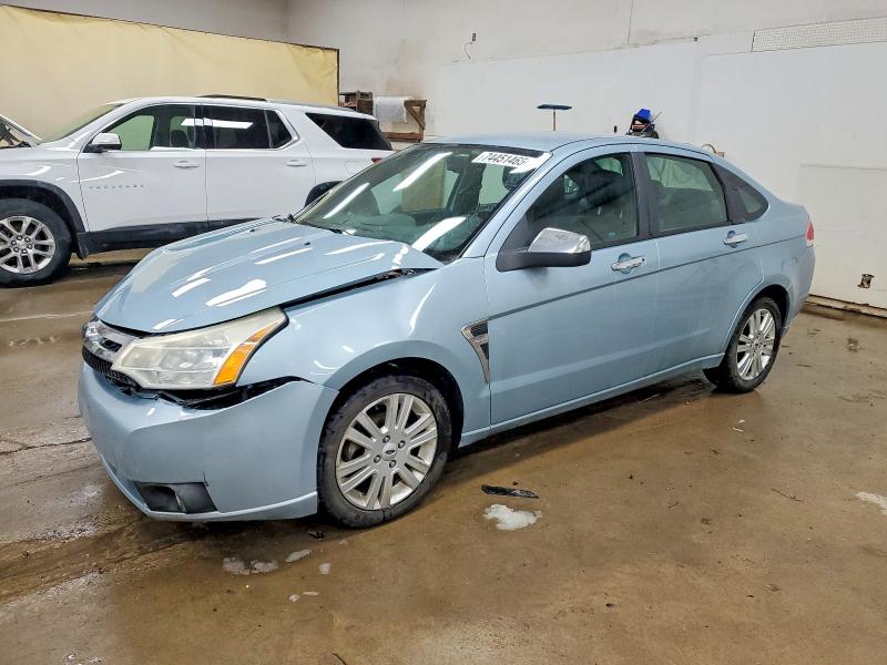 FORD FOCUS 2009 with VIN 1FAHP37N19W224864 - Photo from auction
