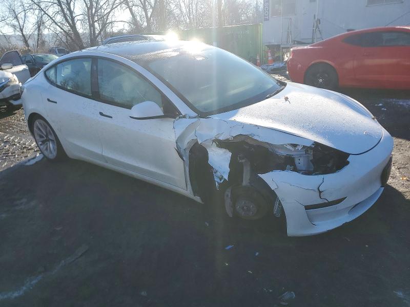 Photo 4 from auction – 2022 TESLA MODEL 3 with VIN 5YJ3E1EB1NF228144